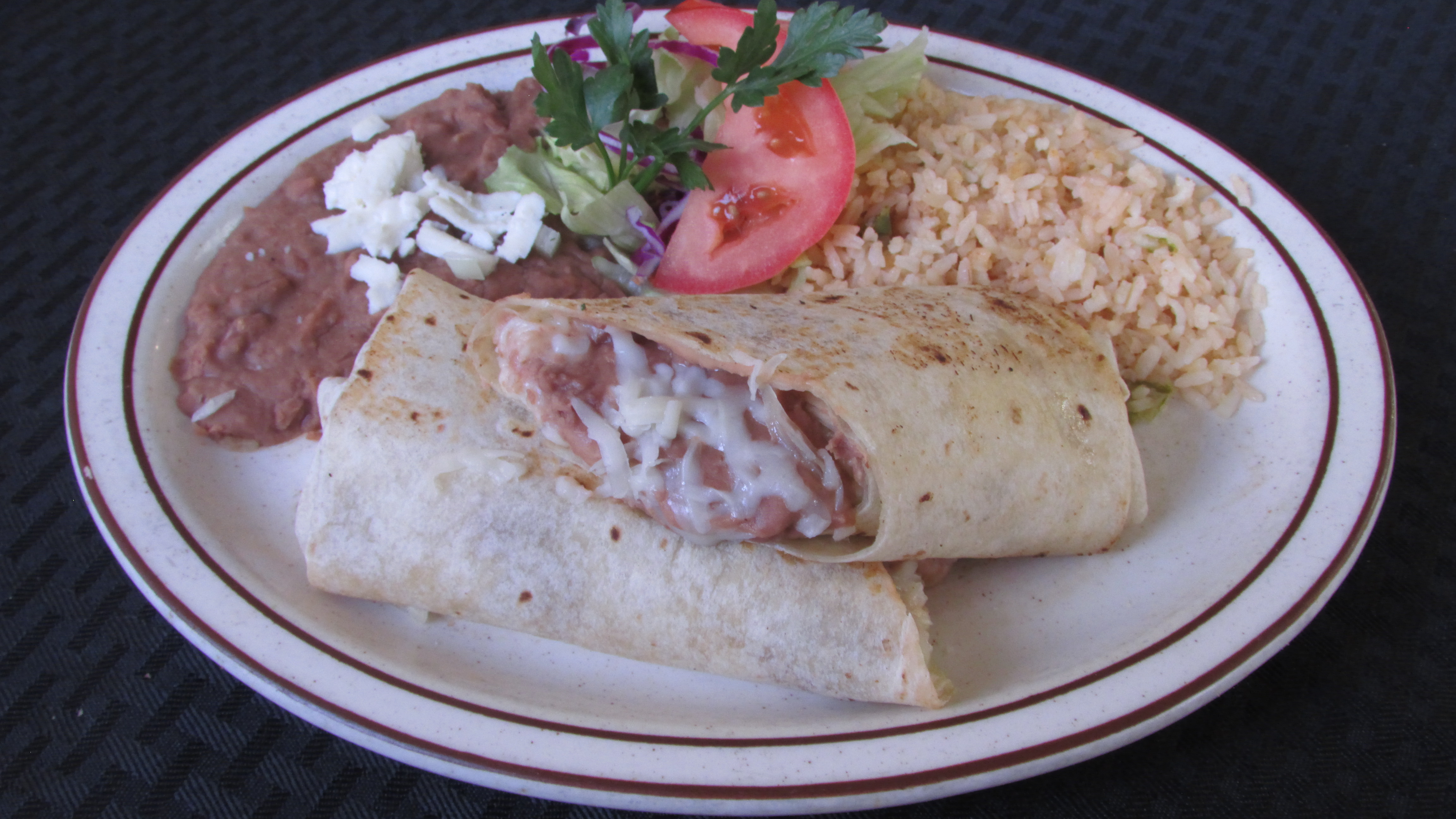 Order Bean & Cheese Burrito food online from Tortillas Restaurant store, Cathedral City on bringmethat.com
