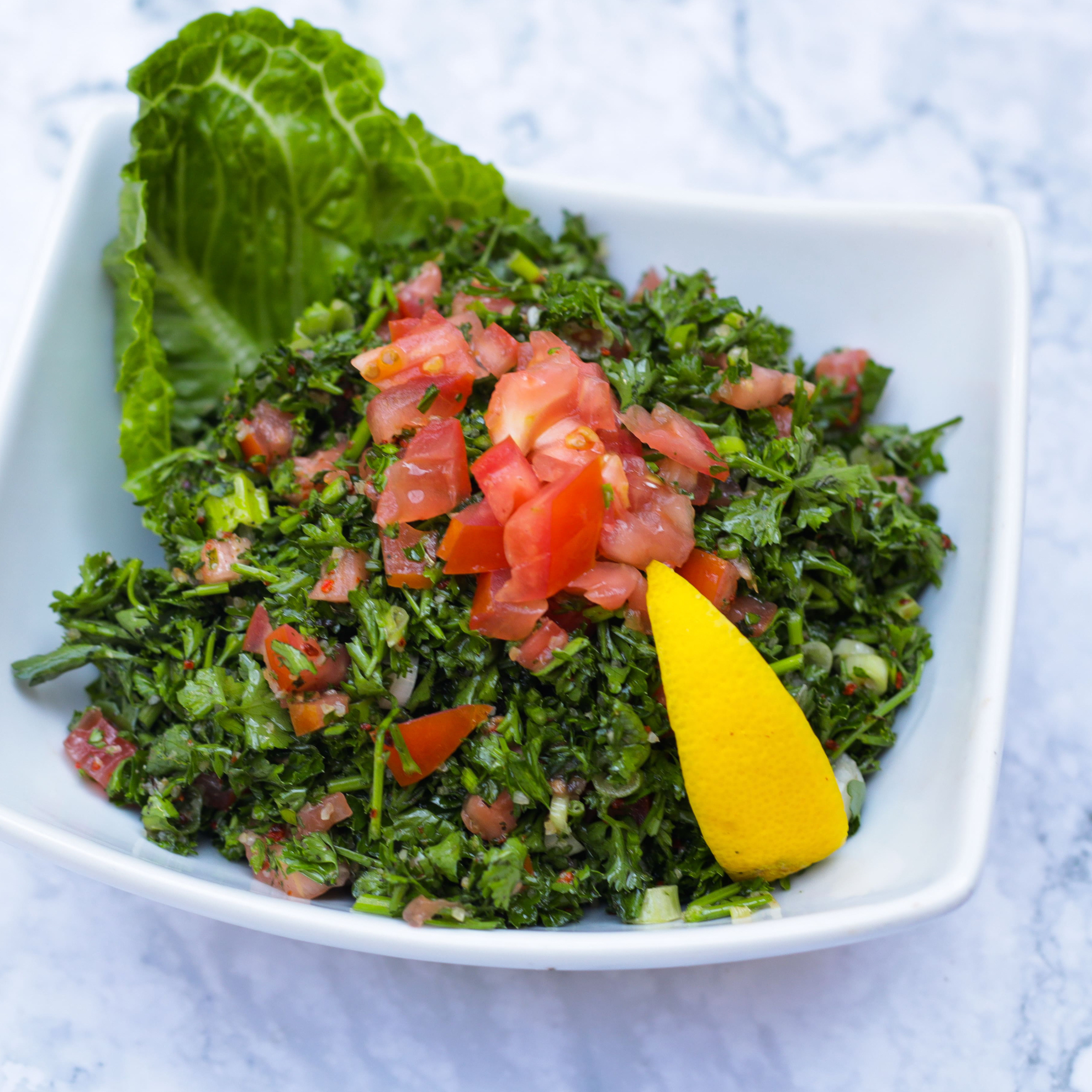 Order Tabbouleh Salad food online from Olive And Grill store, Studio City on bringmethat.com