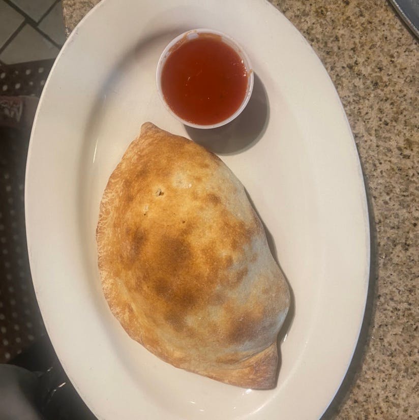 Order Meat & Cheese Calzone - Personal food online from Planet Pizza store, Monroe on bringmethat.com