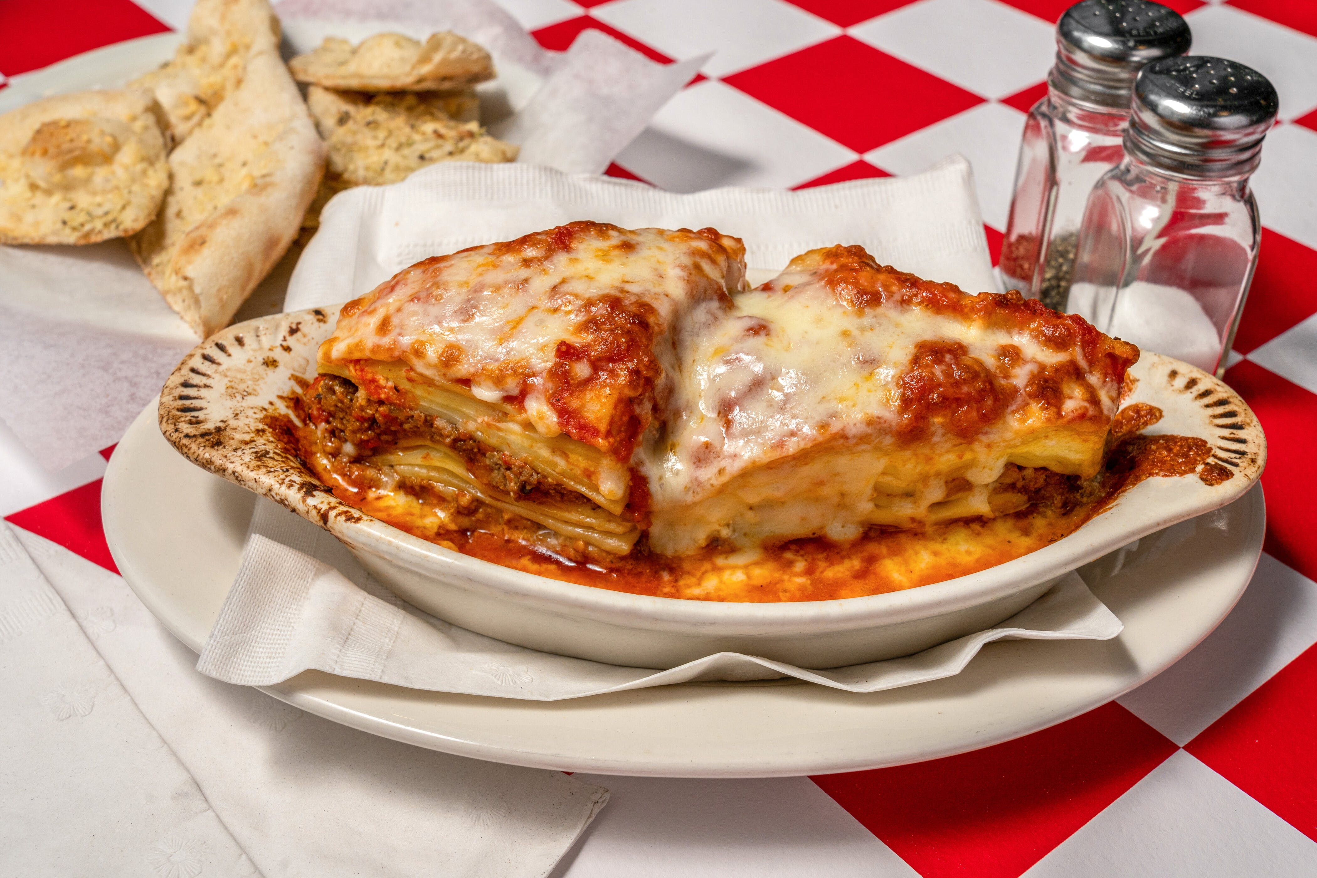 Order Lasagna - Pasta food online from Pizza Works store, Old Saybrook on bringmethat.com