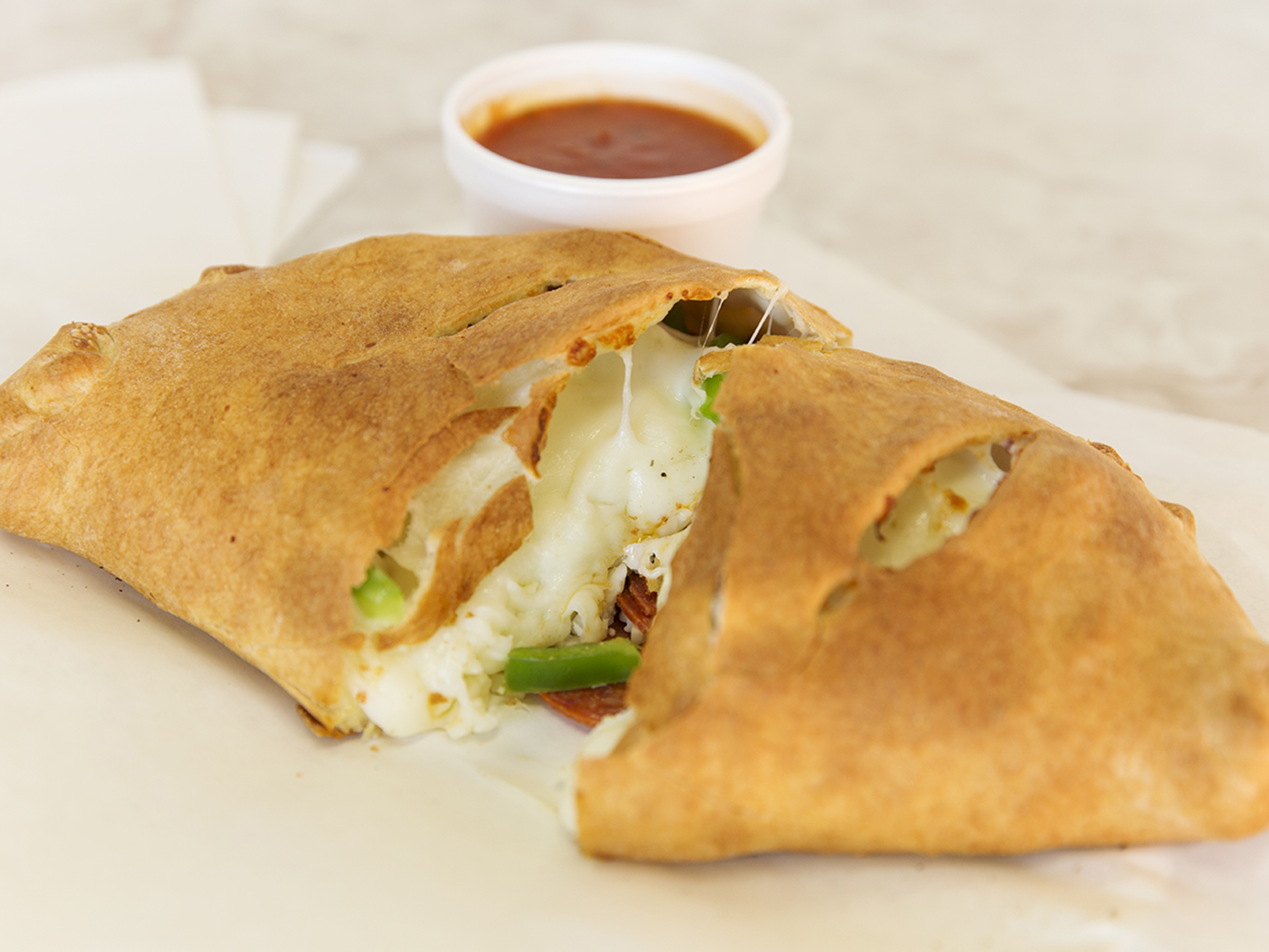 Order My Calzone food online from Mama Mia's Pizza store, Denver on bringmethat.com