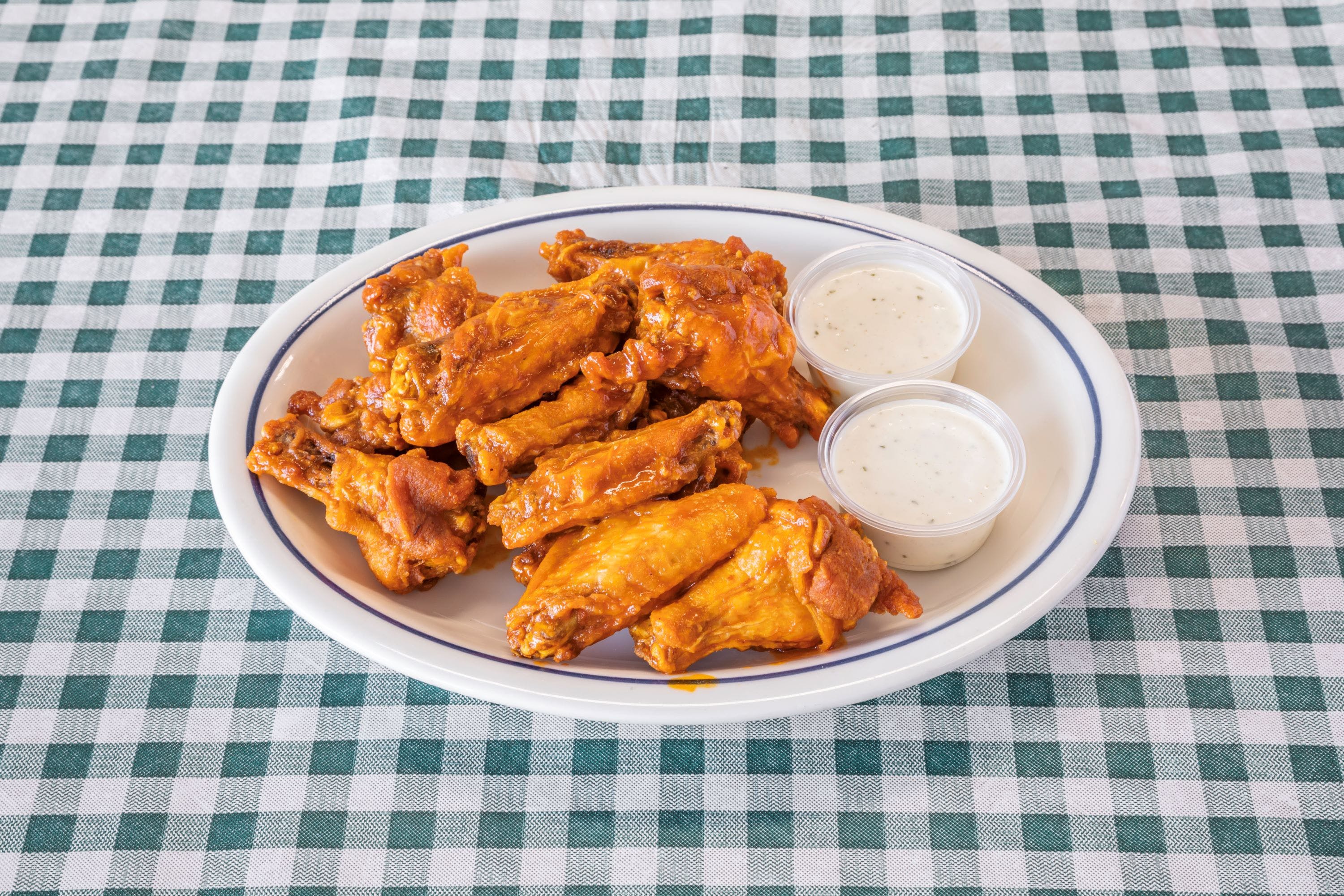 Order Buffalo Style Wings - 12 Pieces food online from Pats Pizza Plus store, Phoneix on bringmethat.com