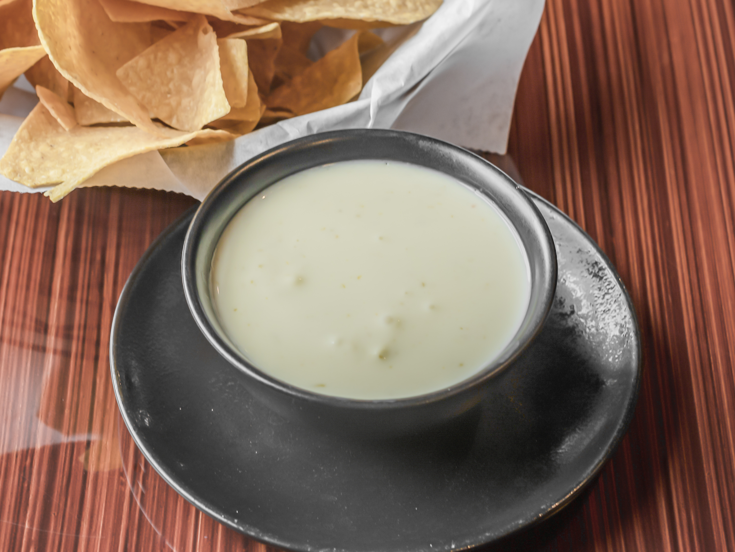Order Queso Dip food online from Los Agaves Grill store, Westfield on bringmethat.com