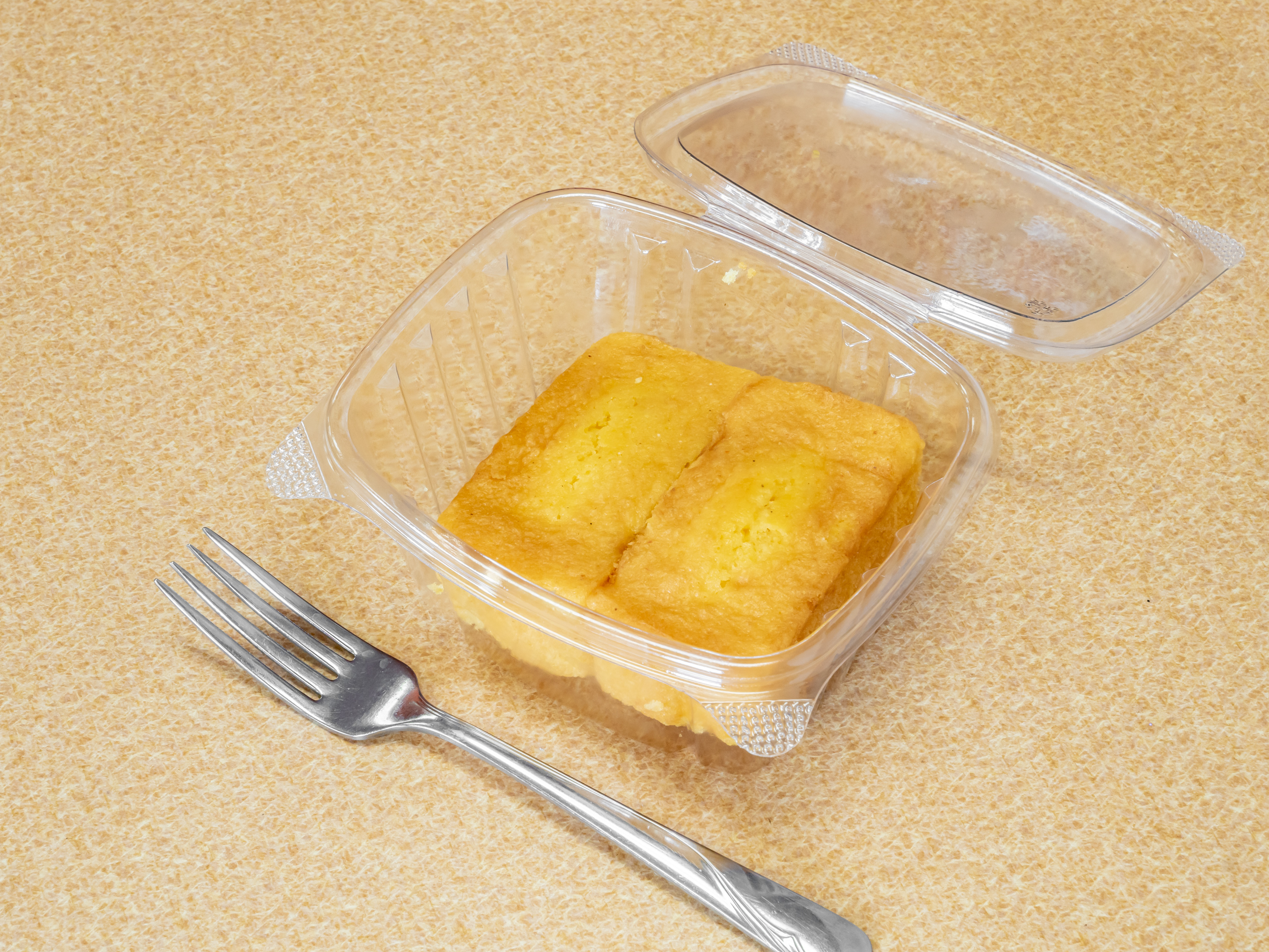 Order Corn bread food online from Toni's African Deli store, Crystal on bringmethat.com