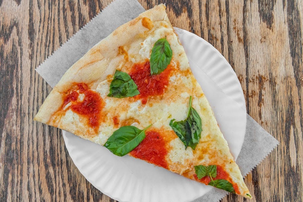 Order Margherita Pizza Slice - Slice food online from Rivoli Pizza II store, New York on bringmethat.com