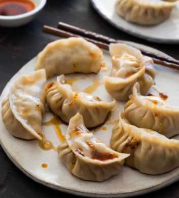 Order Steamed Dumpling (8) food online from China Wok store, Cypress on bringmethat.com