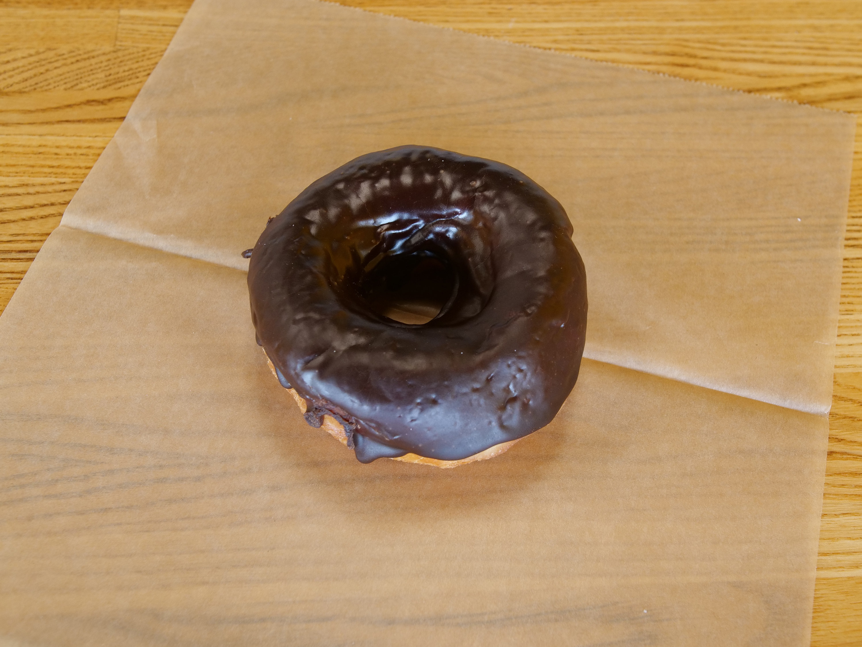 Order Chocolate Glazed Raised Donut food online from The Donut House store, Aurora on bringmethat.com