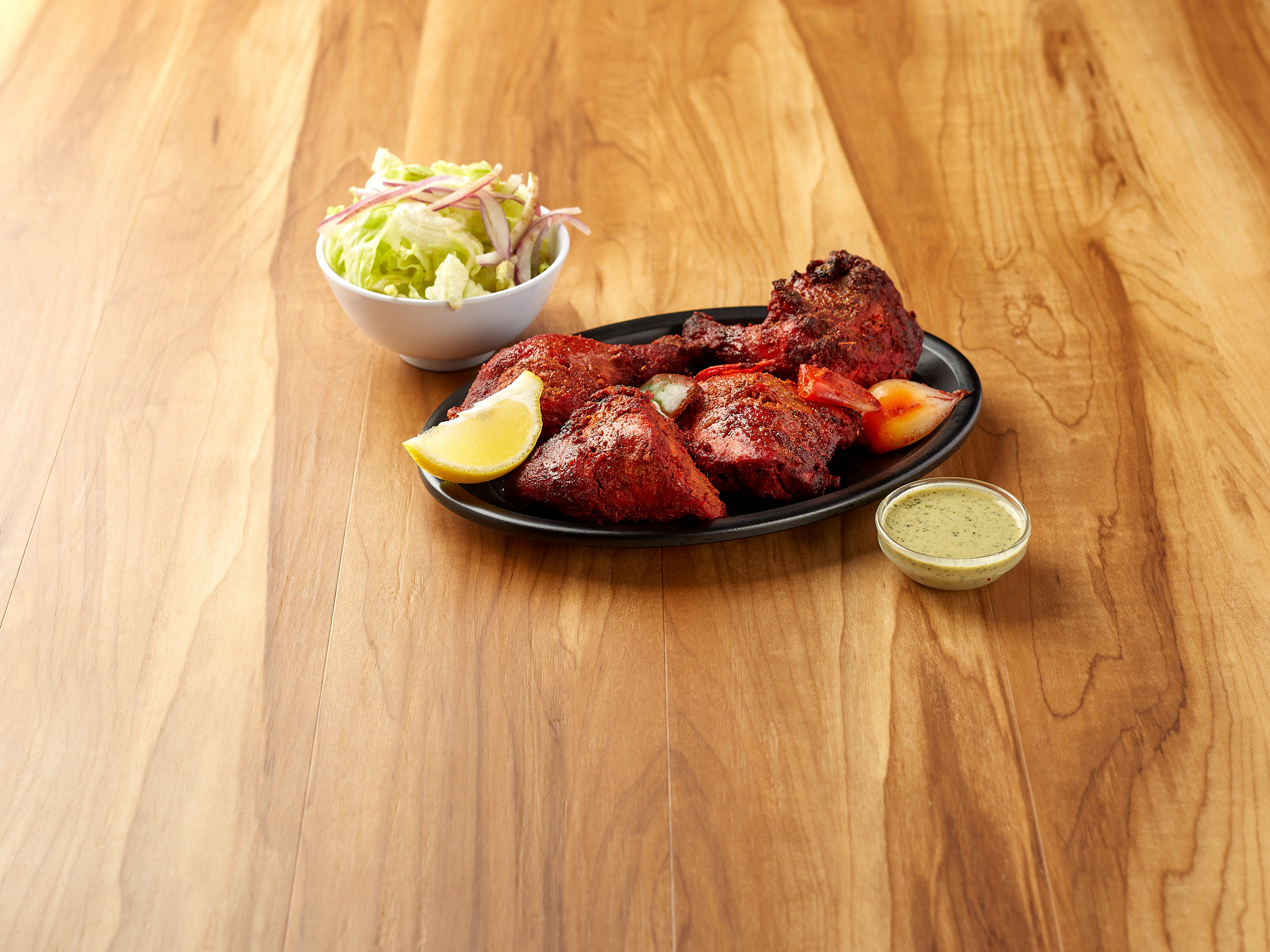 Order Tandoori Chicken food online from Saffron Indian Cuisine store, Norwalk on bringmethat.com