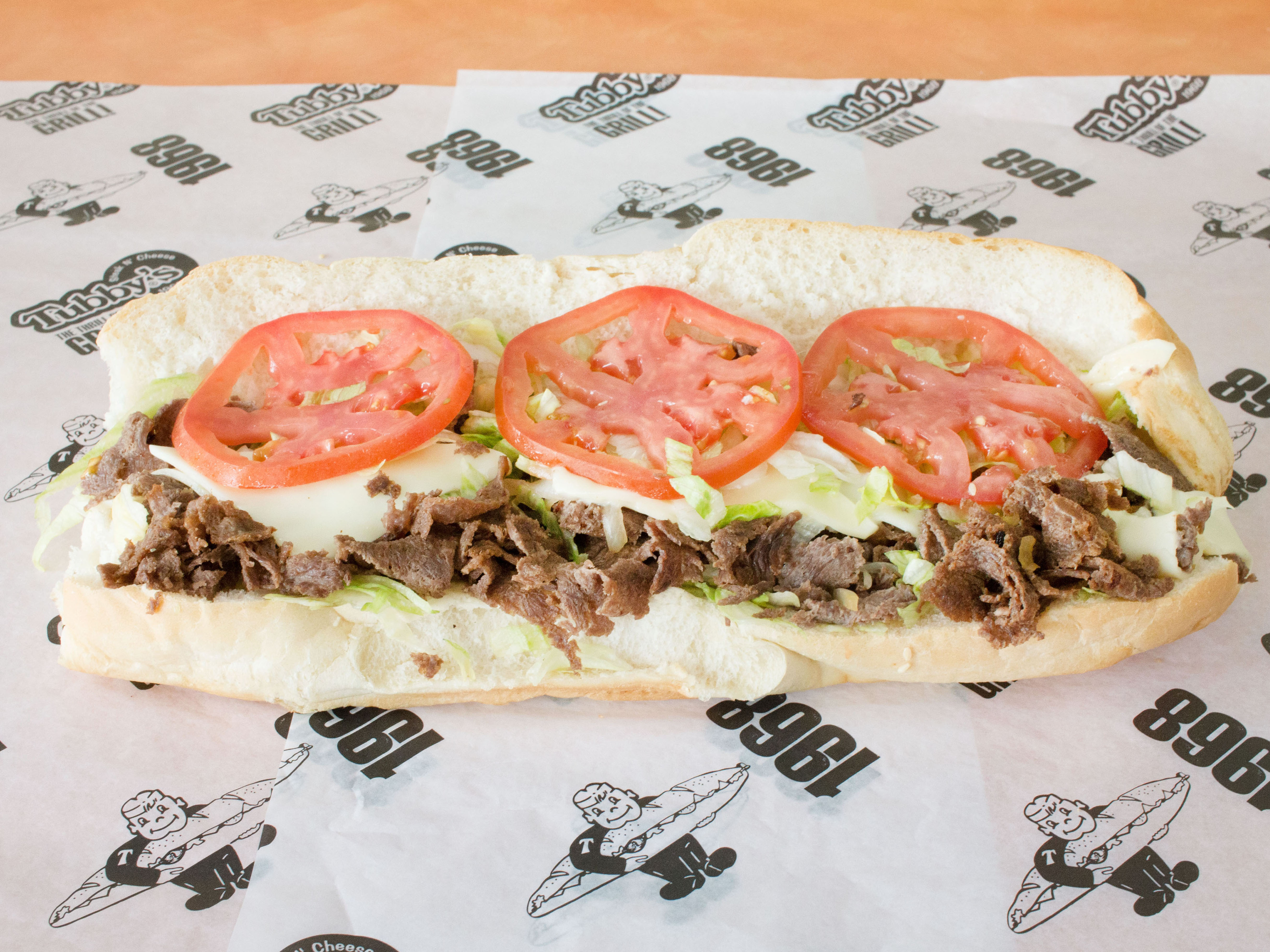 Order Steak and Cheese Sub food online from Tubby Grilled Submarines store, Oak Park on bringmethat.com