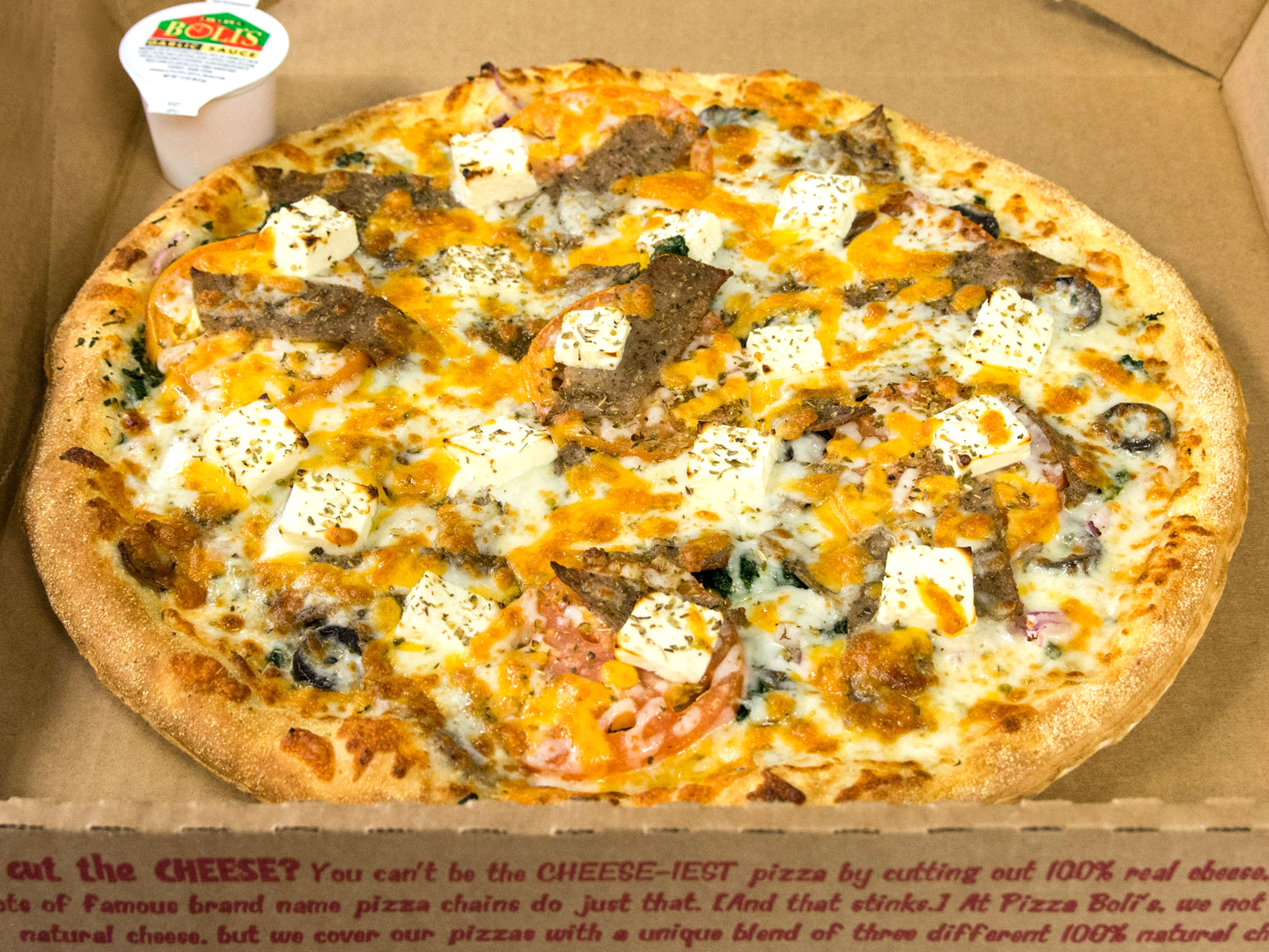 Order Greek Pizza food online from Pizza Boli's store, Alexandria on bringmethat.com