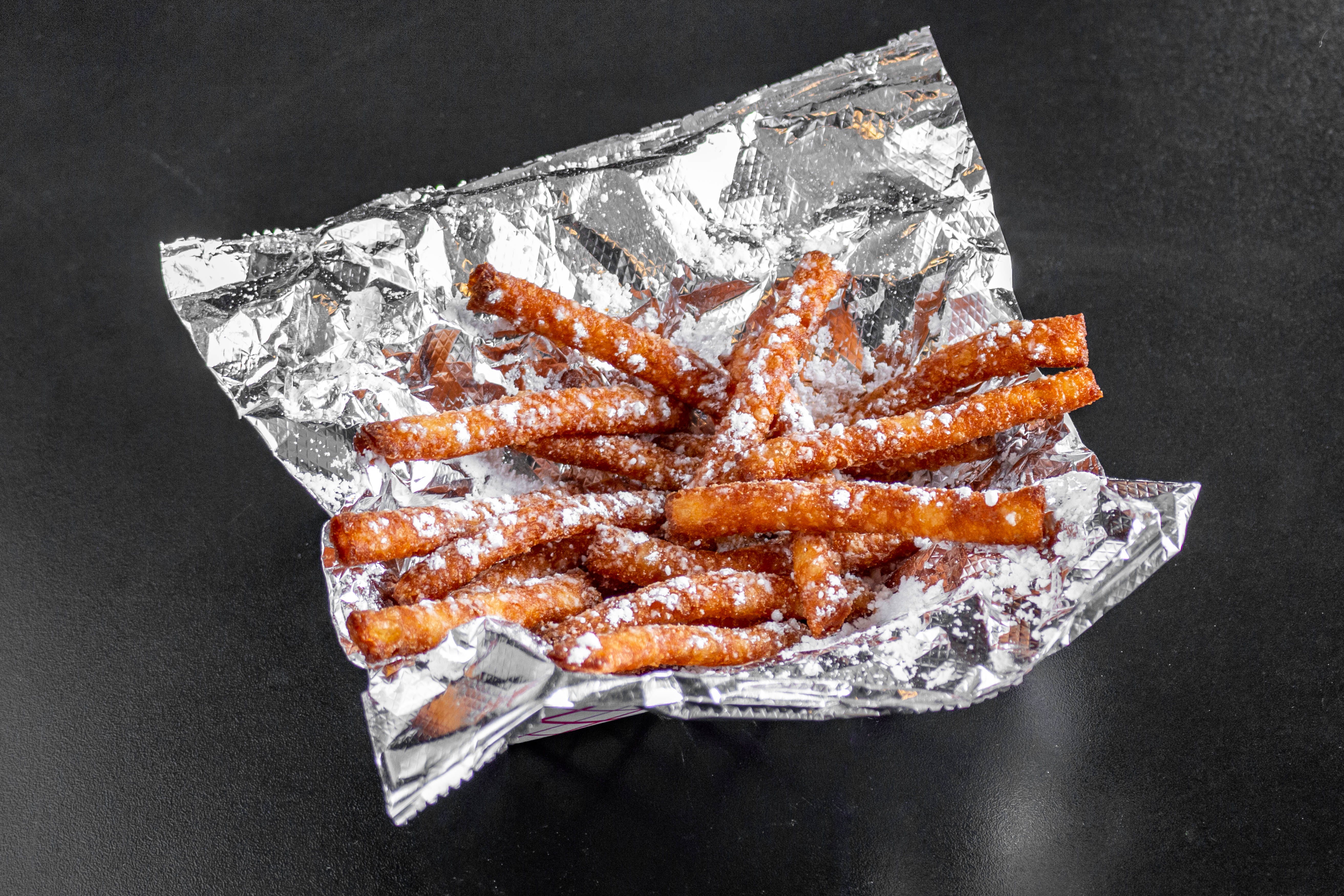 Order Funnel Cake Fries - Dessert food online from Big G's Pizza store, Chicago on bringmethat.com