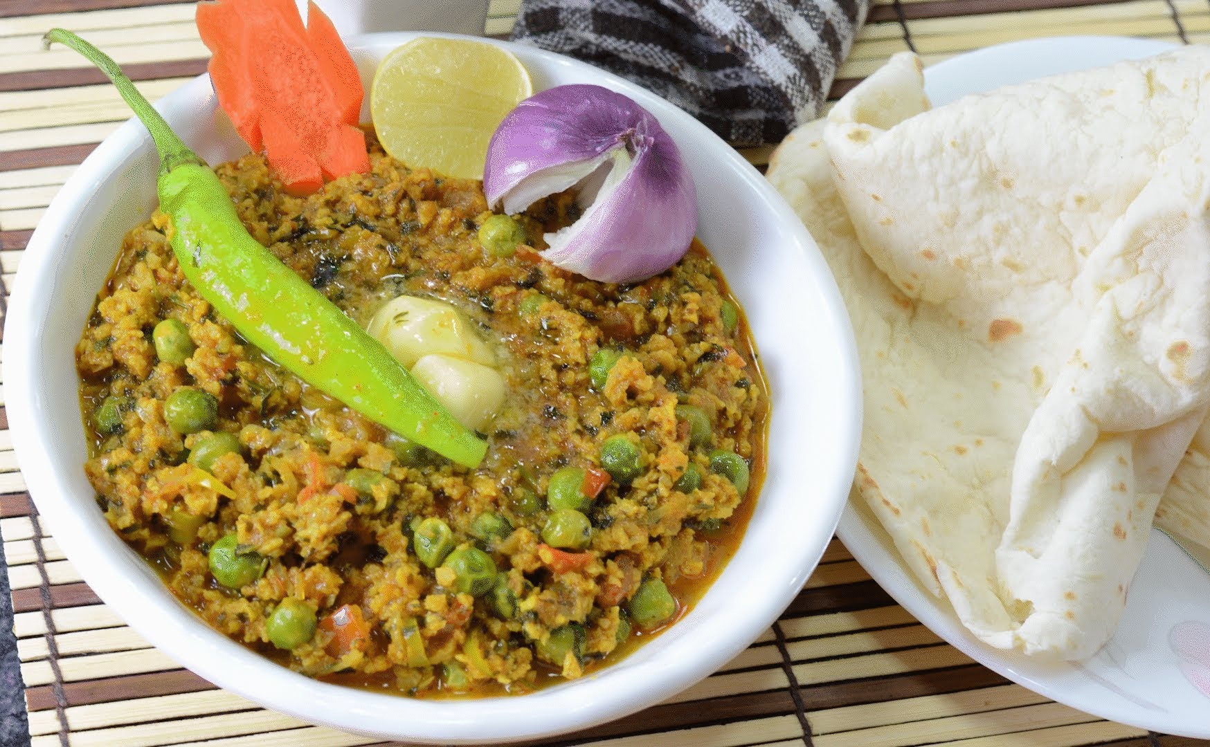 Order Keema Matar with Rice food online from Swad Indian and Nepalese Cousine store, Fort Worth on bringmethat.com