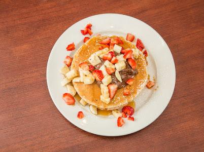 Order Nutella Pancakes w strawberry & banana salsa food online from Galaxy Diner store, New York on bringmethat.com