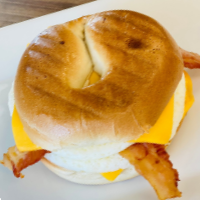 Order Toasted Bagel Sandwich with Egg, Bacon, and Cheese  food online from Simply Vanilla Gourmet store, Lynchburg on bringmethat.com