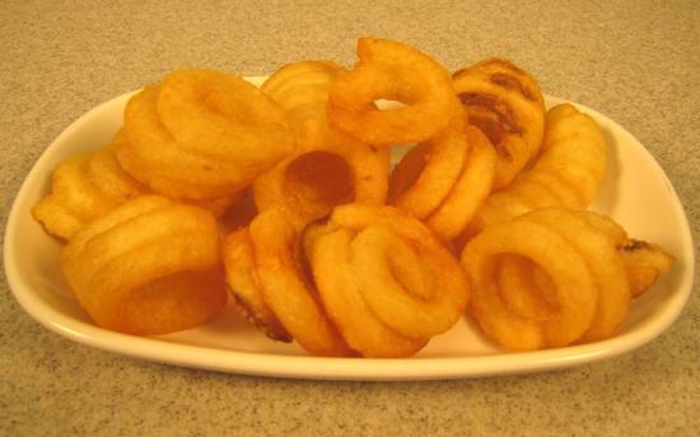 Order Curly Q Fries - Small food online from Cal'z Pizza Subs and Chicken Wings store, Virginia Beach on bringmethat.com