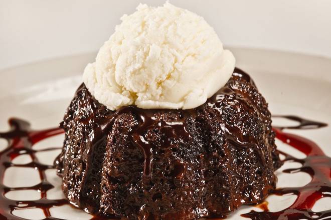 Order WARM CHOCOLATE LAVA CAKE food online from Glory Days Grill store, Providence on bringmethat.com