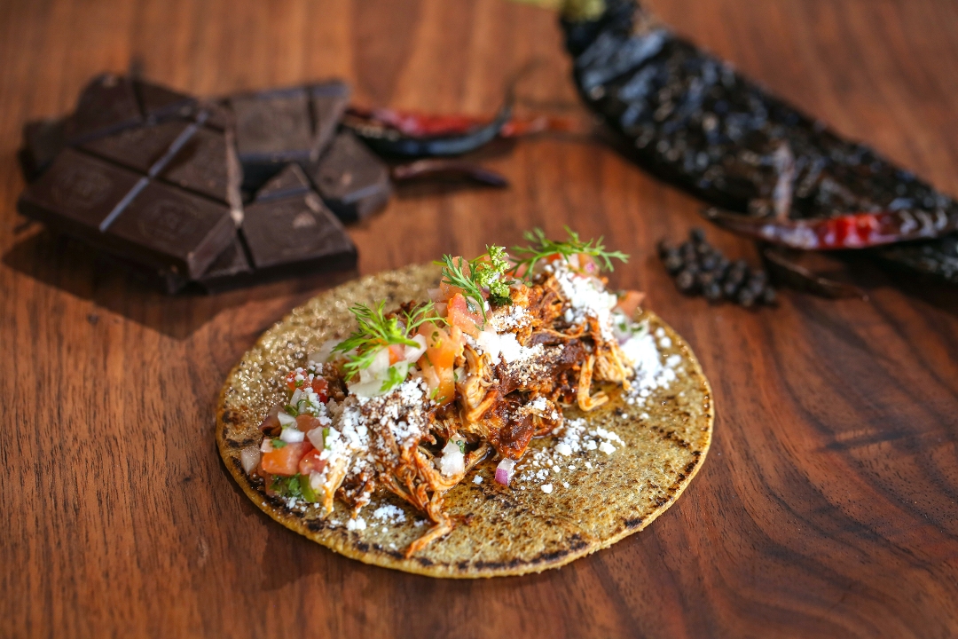 Order Chicken Mole Taco food online from Oaxaca Taqueria store, Brooklyn on bringmethat.com