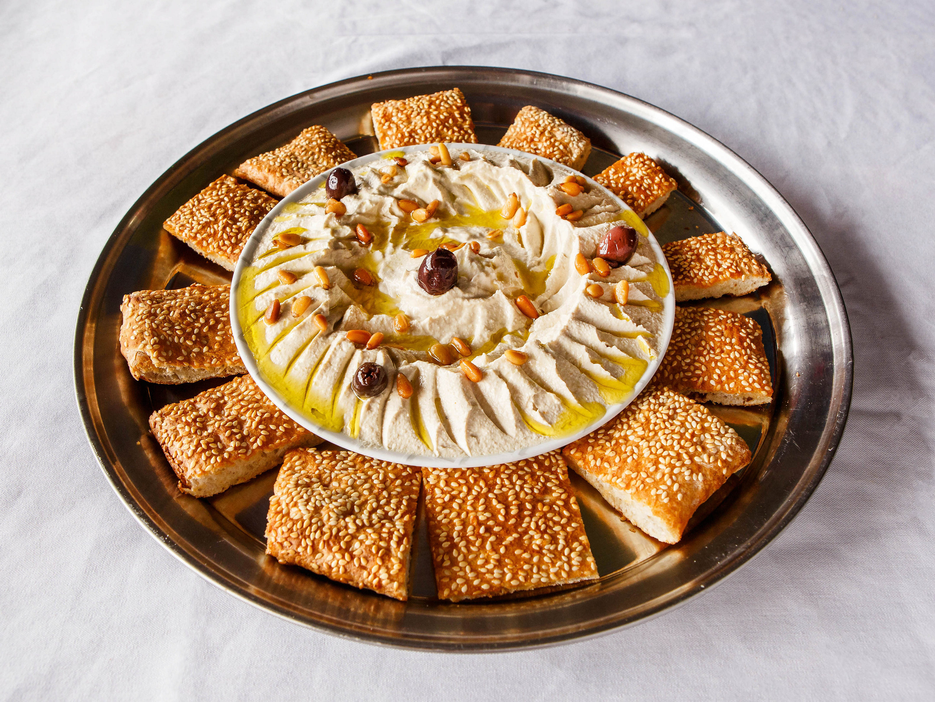 Order Hummus Dip food online from Mama Mia Cuisine store, Knoxville on bringmethat.com