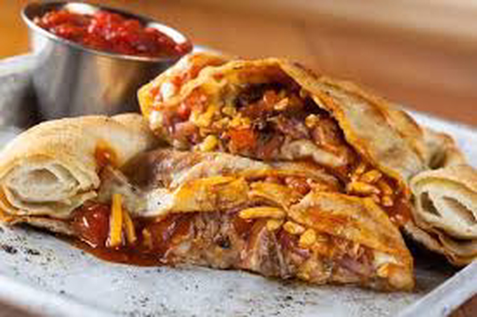 Order Carnitas Calzone (Pork, Onions, Green Peppers) food online from Ocean Pizza store, San Diego on bringmethat.com