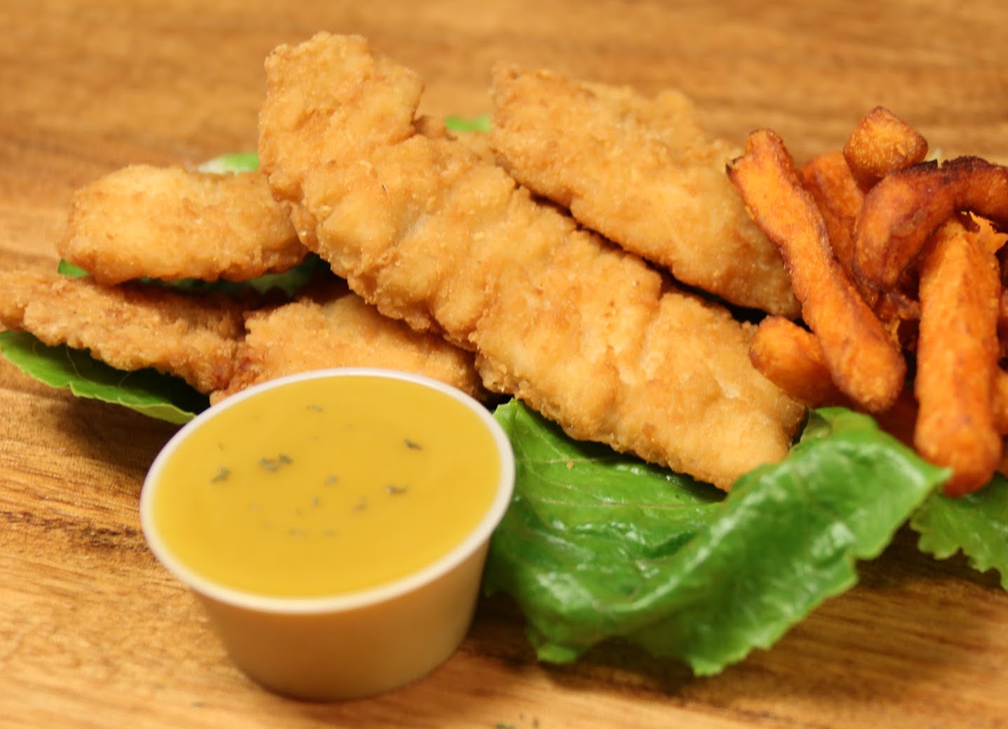 Order 4 Piece Chicken Tenders food online from The Burger Joint store, New York on bringmethat.com