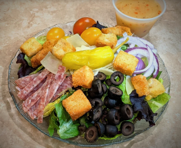 Order Antipasto Salad food online from Ciros Pizza Cafe store, Citrus Heights on bringmethat.com