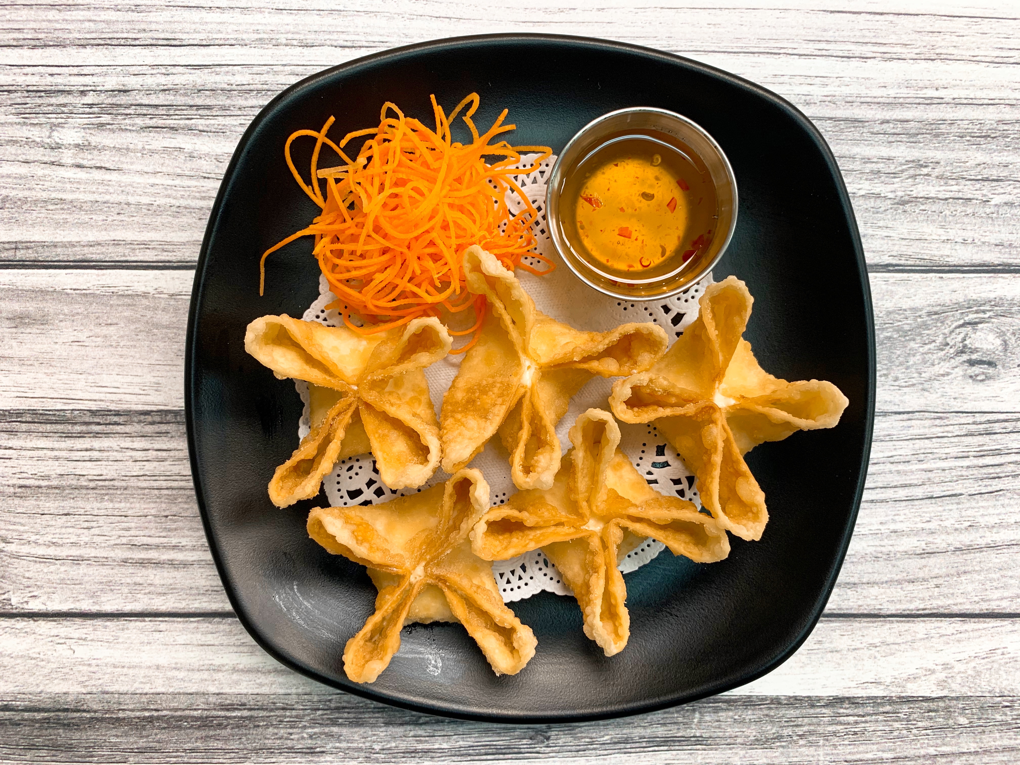 Order A5. Cream Cheese Wontons food online from S!!! Thai Food store, Temecula on bringmethat.com