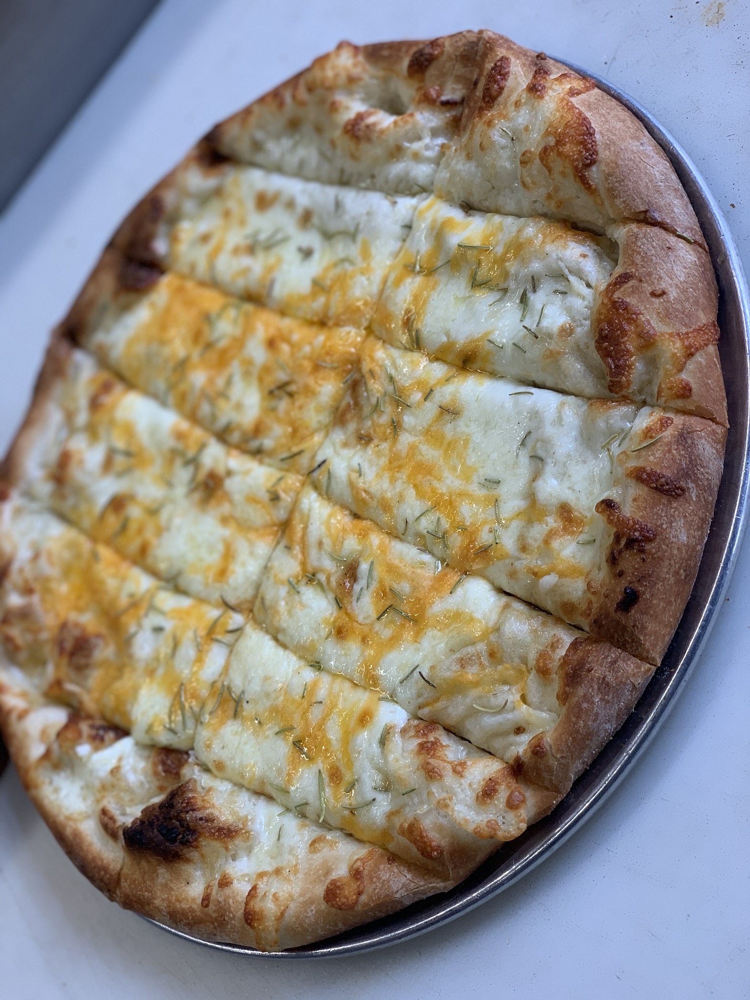 Order Garlic Cheesy Bread food online from Slyce Pizza store, Fort Collins on bringmethat.com