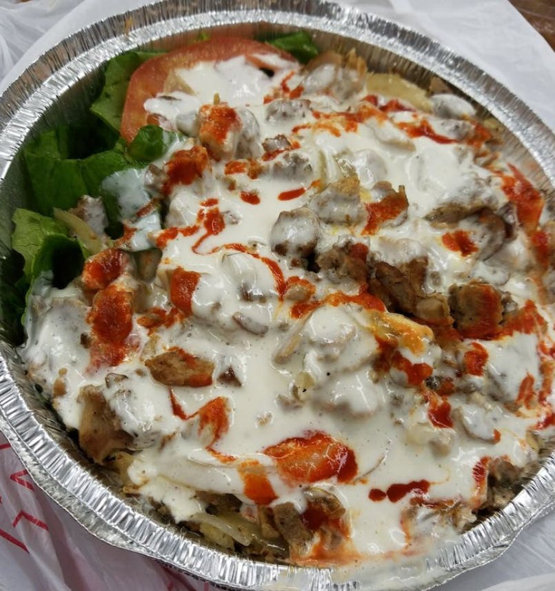 Order Mixed Chicken & Lamb Over Rice - Platter food online from Italiano's store, Blacksburg on bringmethat.com