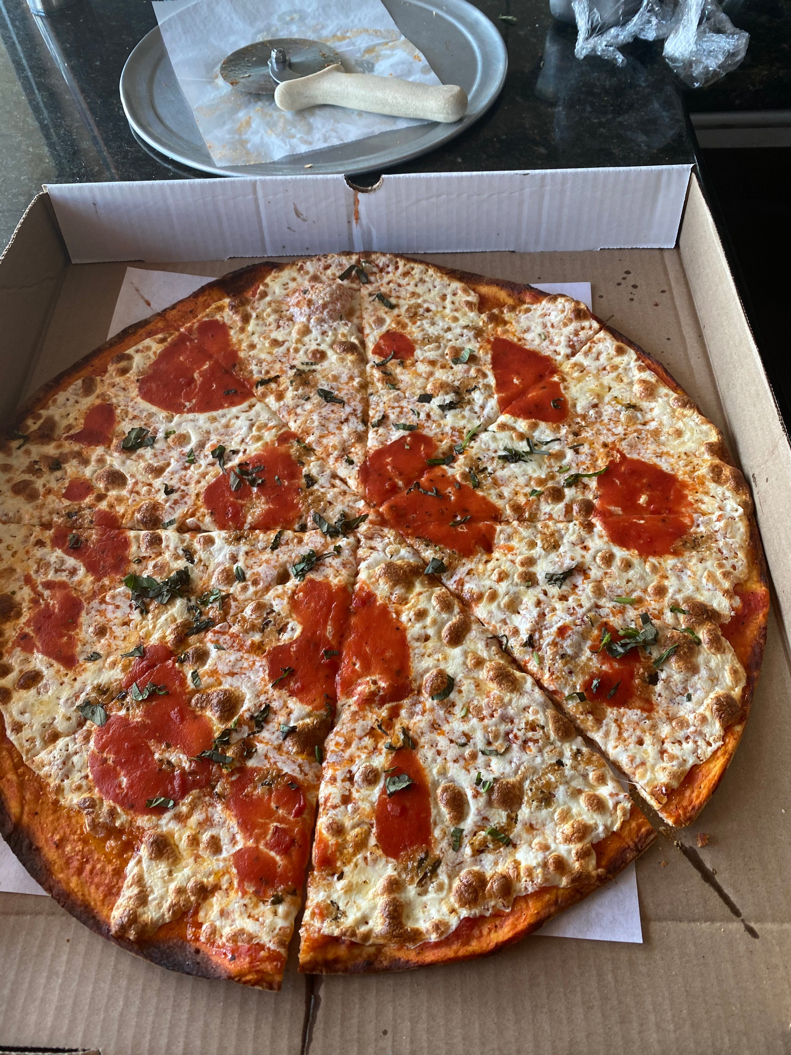 Order Traditional Thin Crust Cheese Pizza - 10'' (4 Cut) food online from Michelangelo's Pizza store, East Brunswick on bringmethat.com