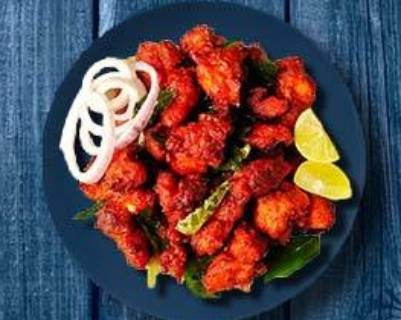 Order Dynamite Chicken food online from Mad Over Curry store, Harrisburg on bringmethat.com