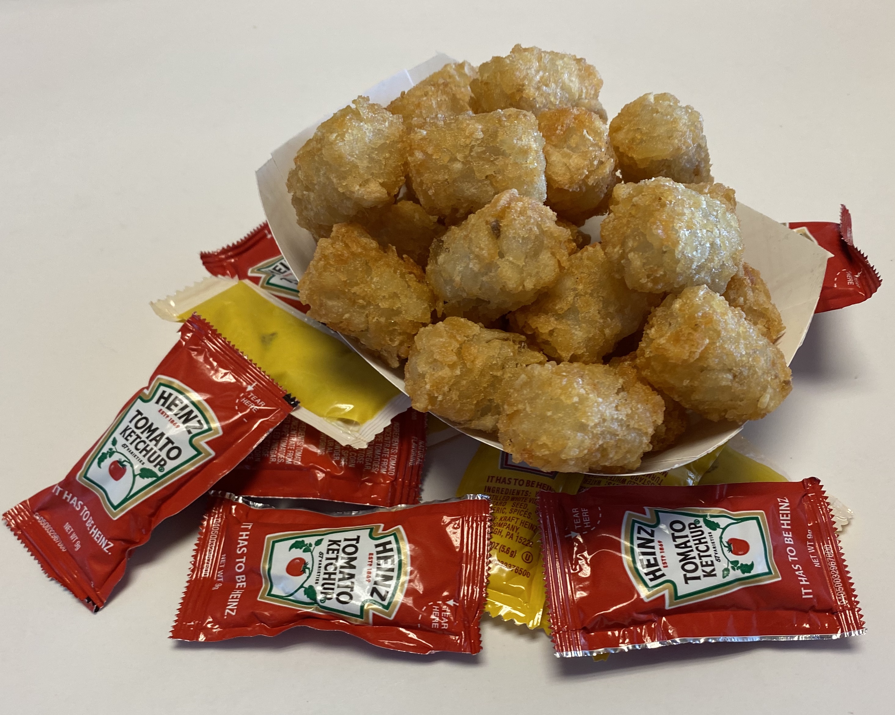 Order Tater Tots food online from Empire Hots store, Webster on bringmethat.com