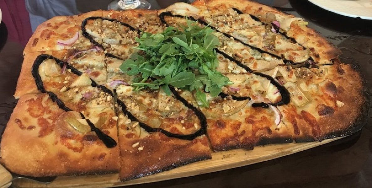 Order Pear Gorgonzola Pizza - Personal food online from The Brick Oven Bistro store, Sandusky on bringmethat.com