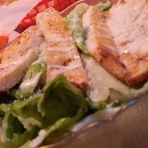Order Grilled Chicken Caesar Salad food online from Uncle Sams store, Peoria on bringmethat.com