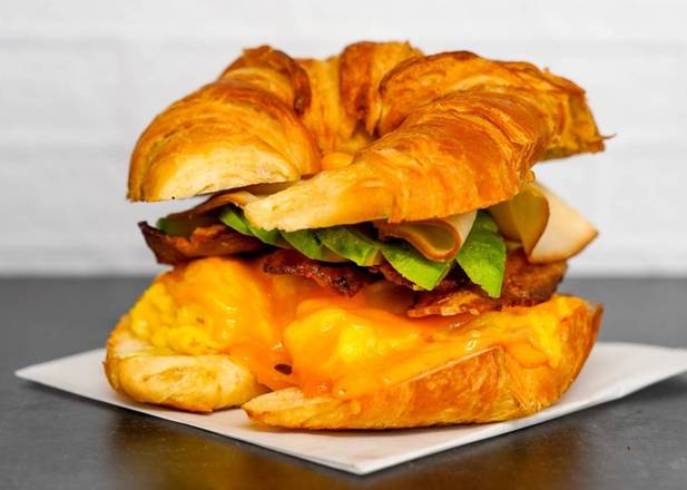 Order Croissant, Bacon, Turkey, Avocado, Egg, & Cheddar food online from Neighborhood Cafe store, Hopewell on bringmethat.com