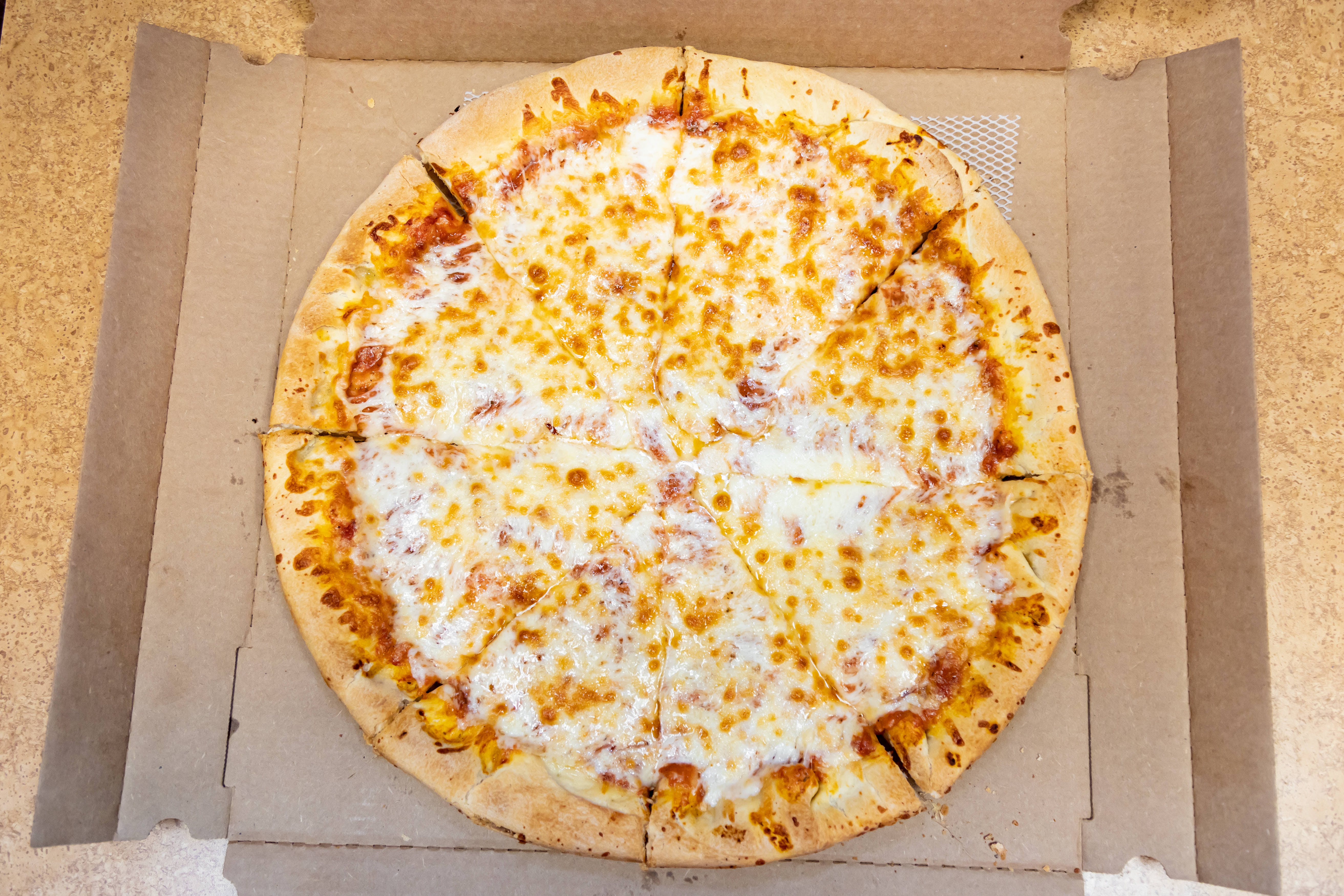 Order Famous Cheese Pan Pizza - Small 12" (Serves 2-3 People) food online from Mario Pizza store, North Aurora on bringmethat.com