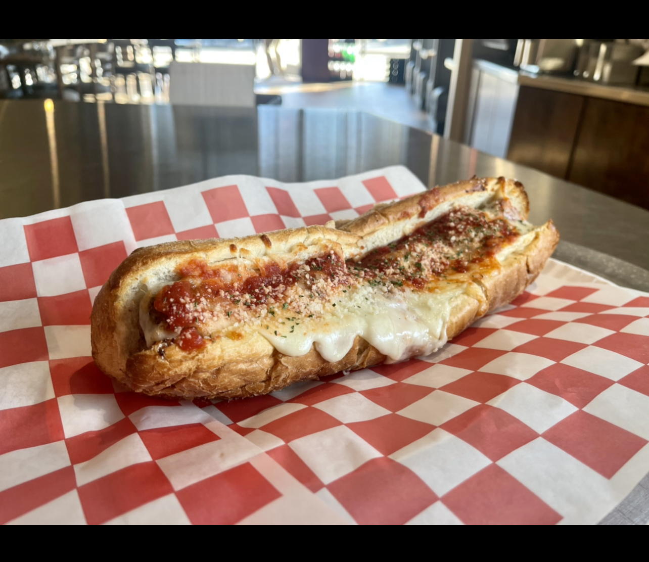 Order Meatball Parmesan Sub food online from Johnny's Pizza store, Cary on bringmethat.com