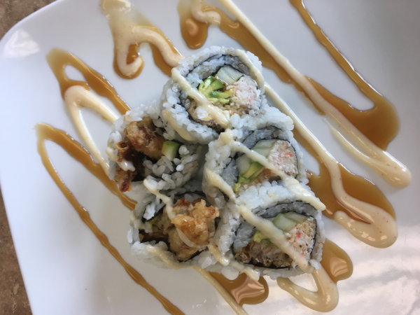 Order 6 Piece Soft Shell Crab Roll food online from Jazz Sushi Bar store, New Orleans on bringmethat.com