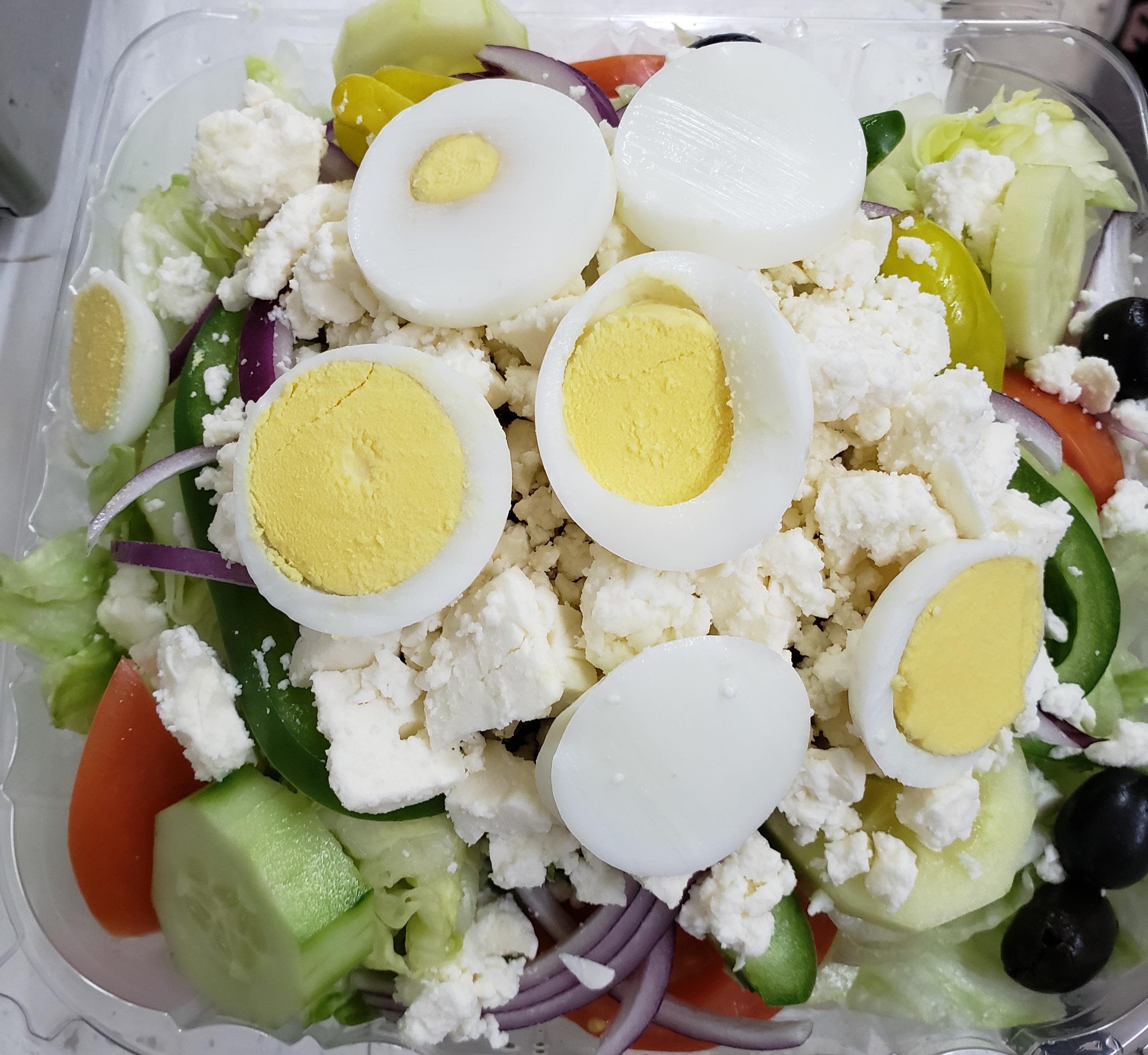 Order Greek Salad food online from Pizza Mart store, Baltimore on bringmethat.com