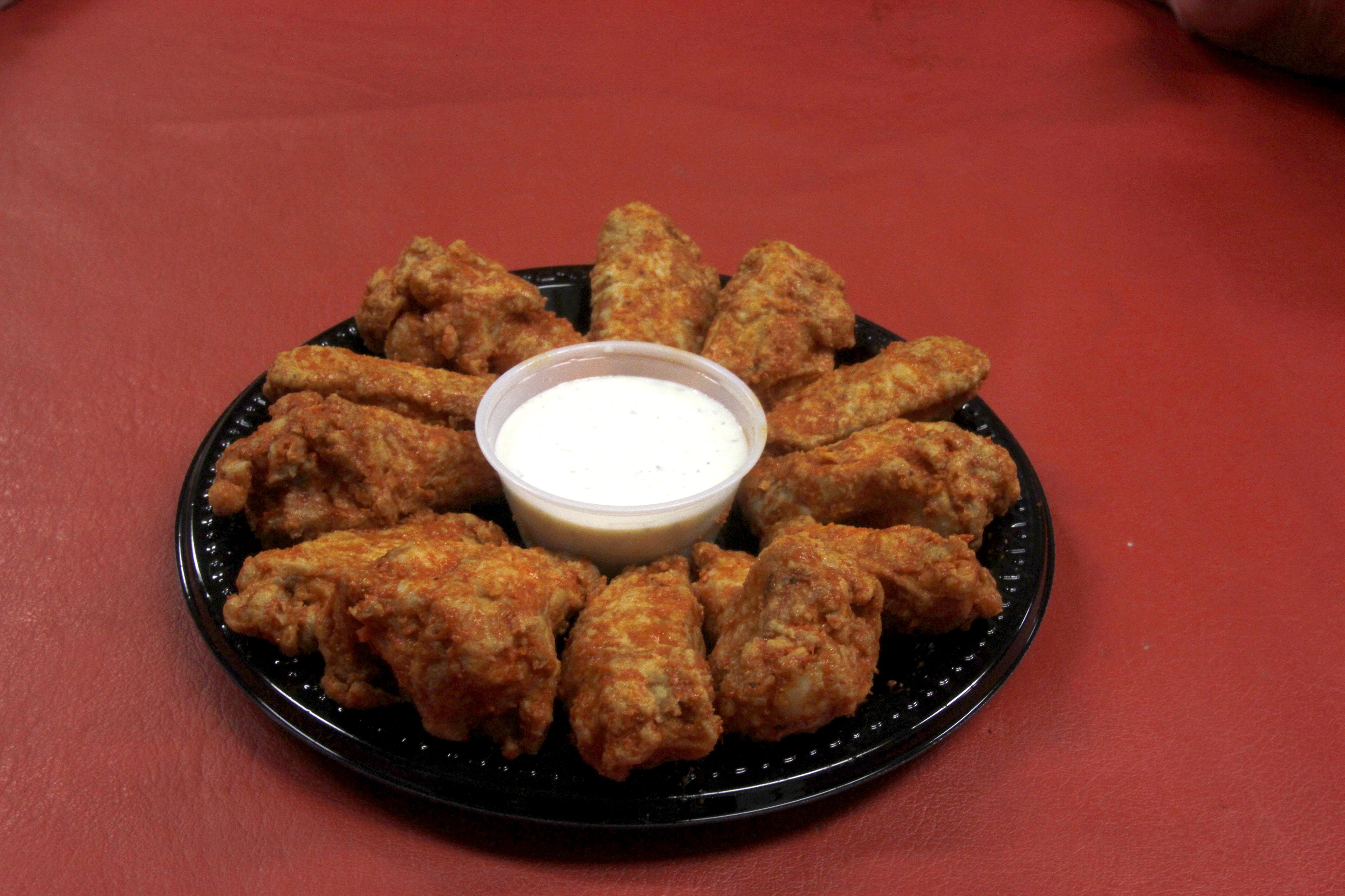 Order BBQ Chicken Wings - Appetizer food online from Fratelli Ny Pizza store, Canoga Park on bringmethat.com