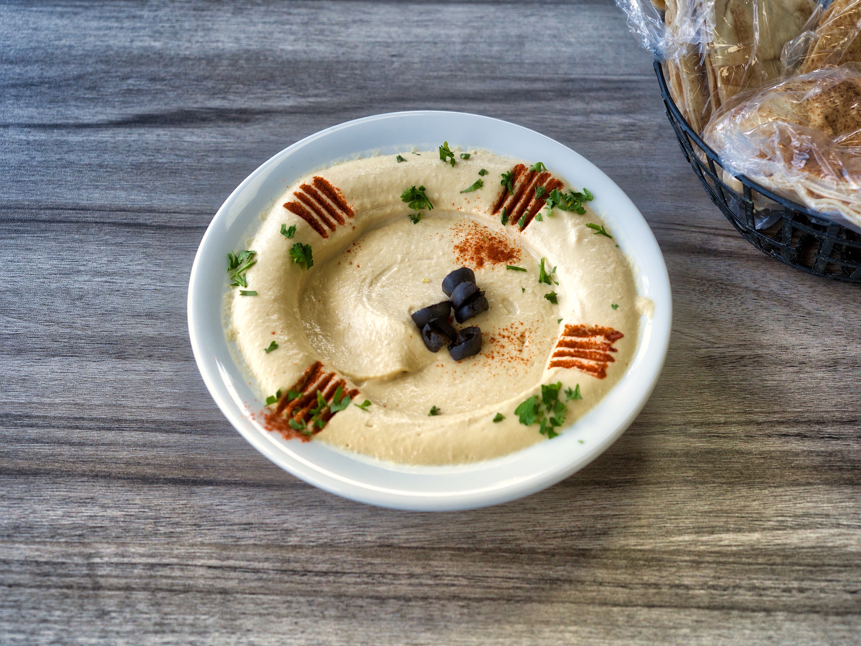 Order Hommous food online from Kabob Hut store, Sterling Heights on bringmethat.com