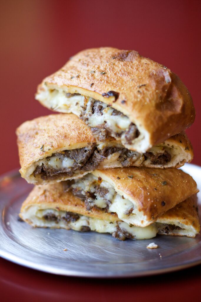 Order Philly Cheesesteak Stromboli  food online from DoubleDave's Pizza store, Cedar Park on bringmethat.com