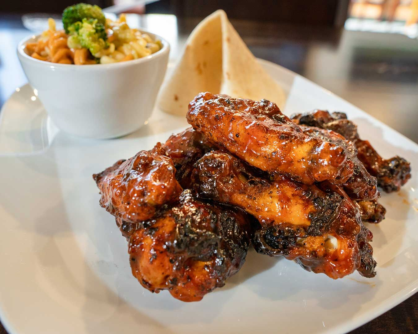 Order 6 BBQ Wings with Side food online from Nevada Chicken Cafe store, Las Vegas on bringmethat.com