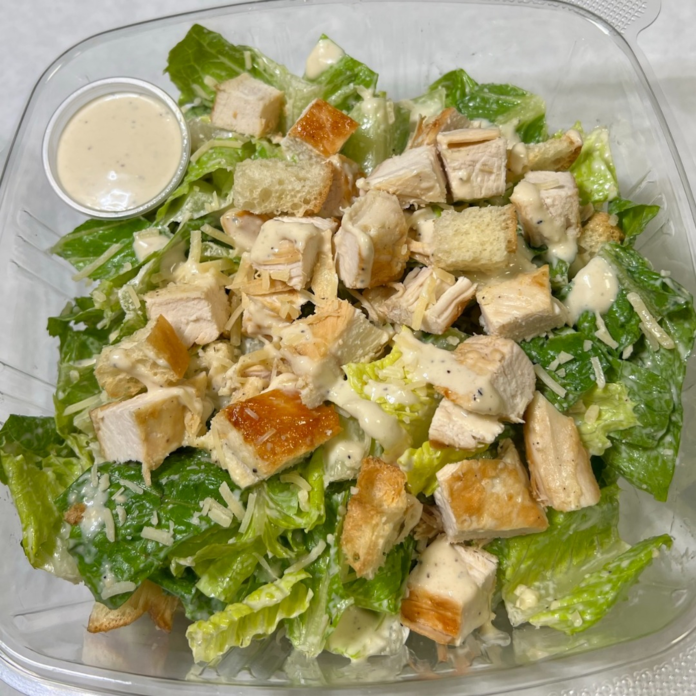 Order Grilled Chicken Caesar Salad food online from Fresh Millions Restaurant store, San Ramon on bringmethat.com