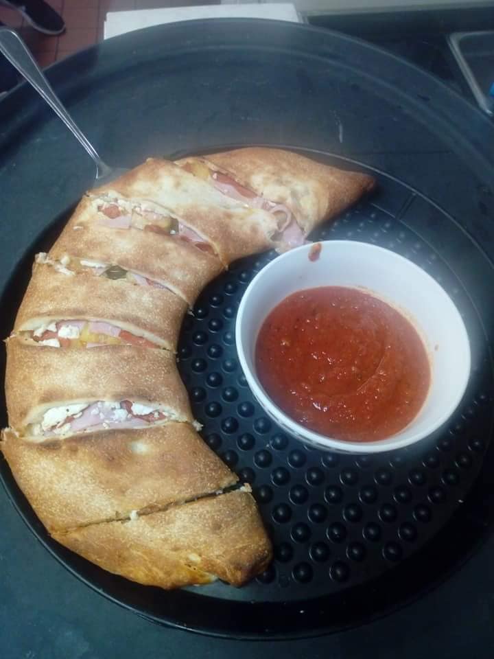 Order Giuseppe's Special Calzone food online from Giuseppe's Restaurant store, Victorville on bringmethat.com