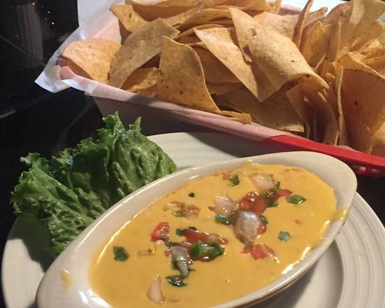Order Chips and Cajun Queso food online from Swamp shack store, Friendswood on bringmethat.com