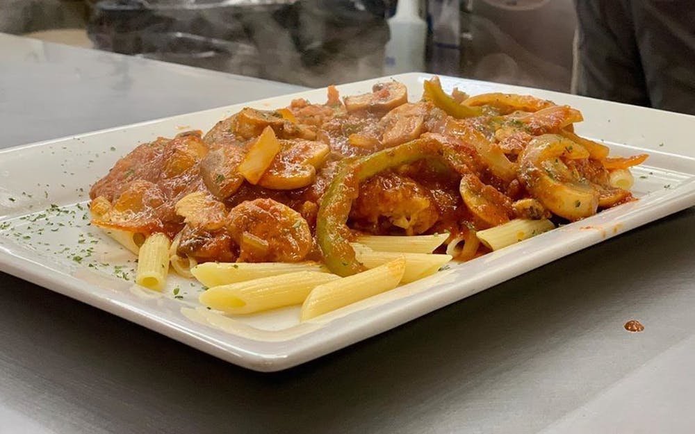Order Chicken Cacciatore over Pasta - Entree food online from Hometown Pizza store, Litchfield on bringmethat.com