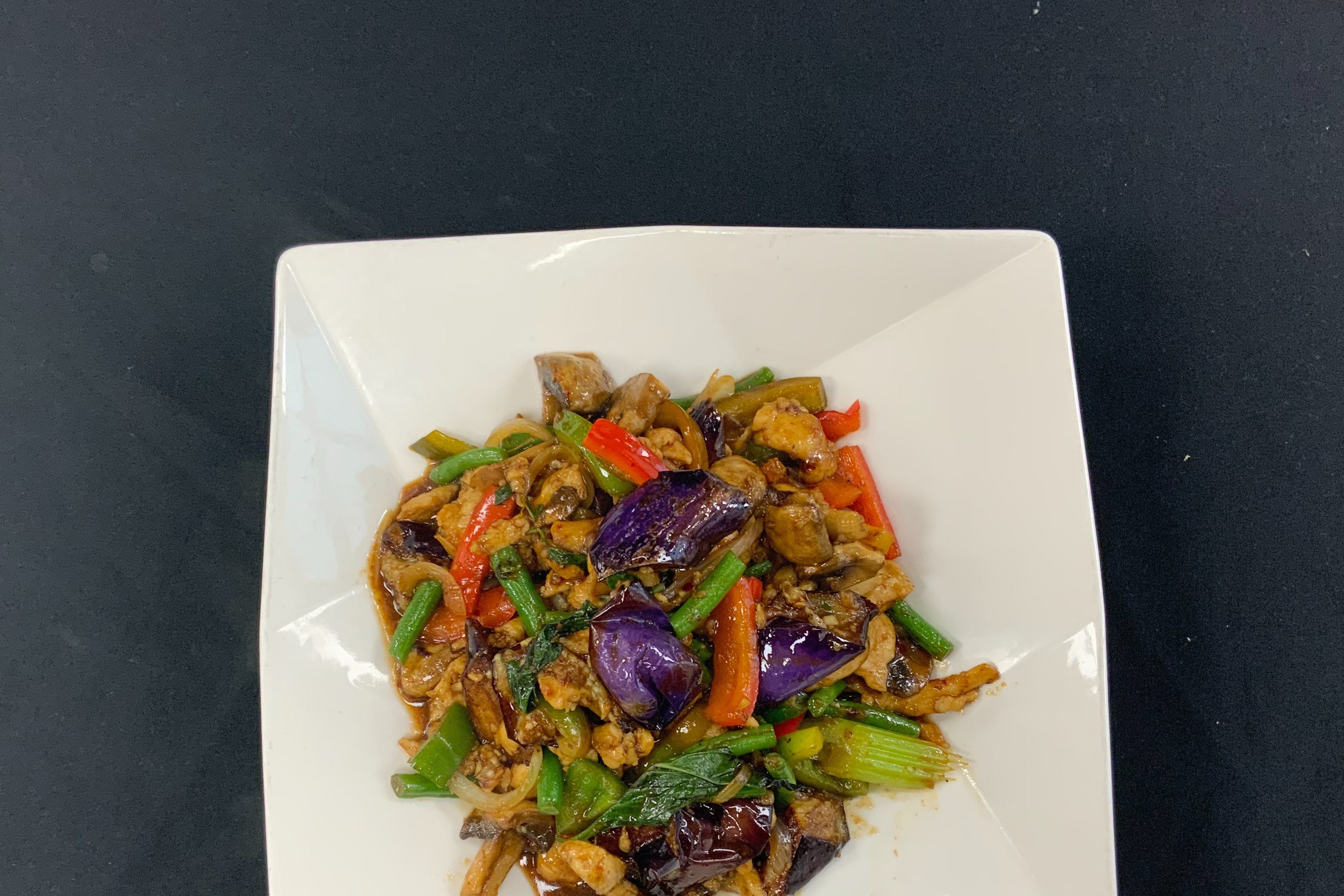 Order Spicy egg plant food online from Rai Lay Thai Cuisine store, Charlotte on bringmethat.com