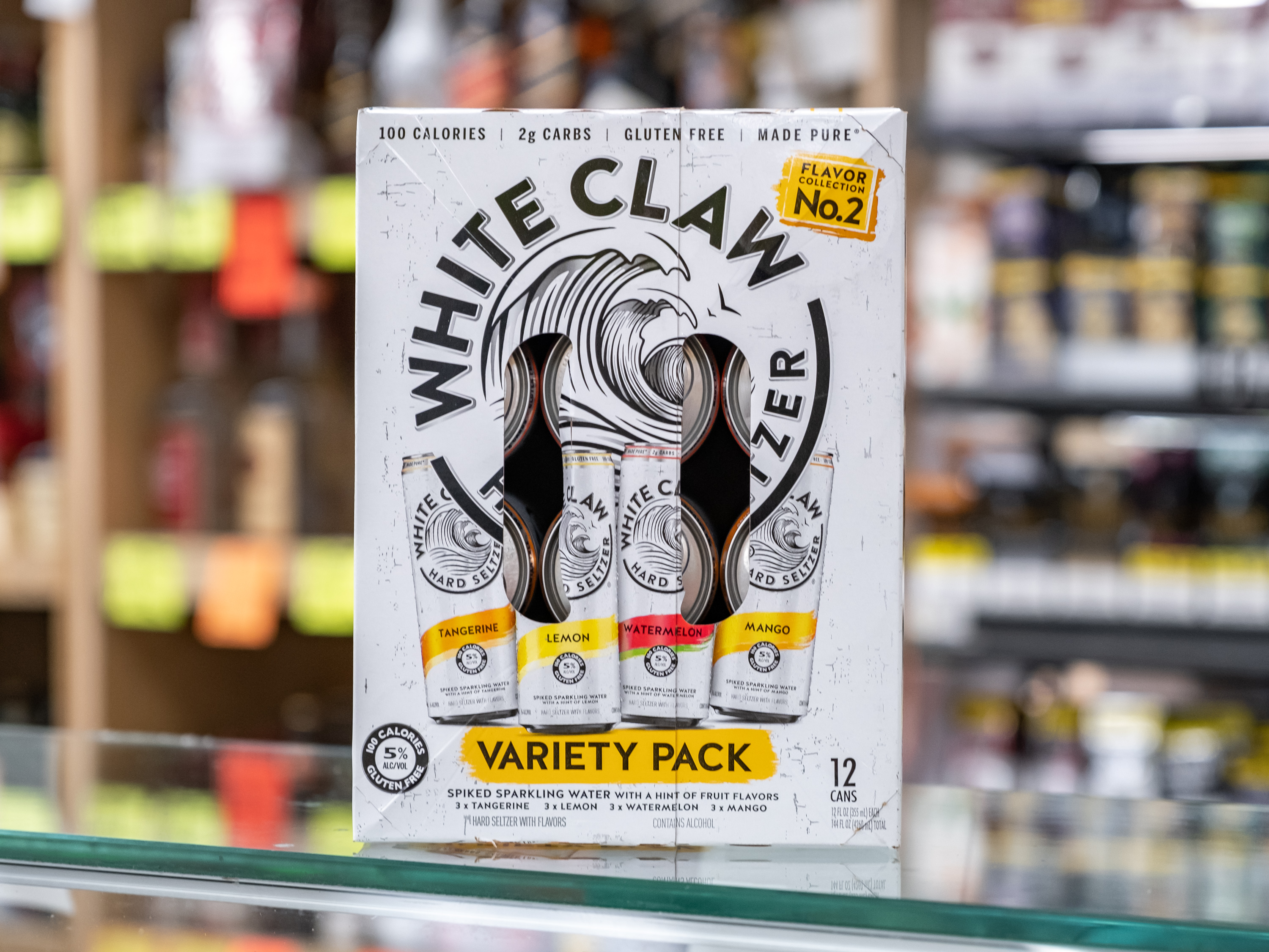 Order White Claw Hard Seltzer Variety Pack Flavor Collection No 2 food online from Circle S Food Store store, Orange on bringmethat.com
