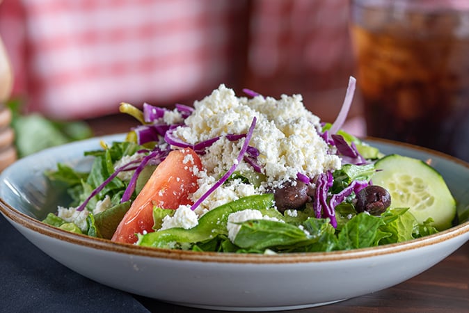 Order Greek Salad - Small food online from Russo's Pizza store, San Antonio on bringmethat.com