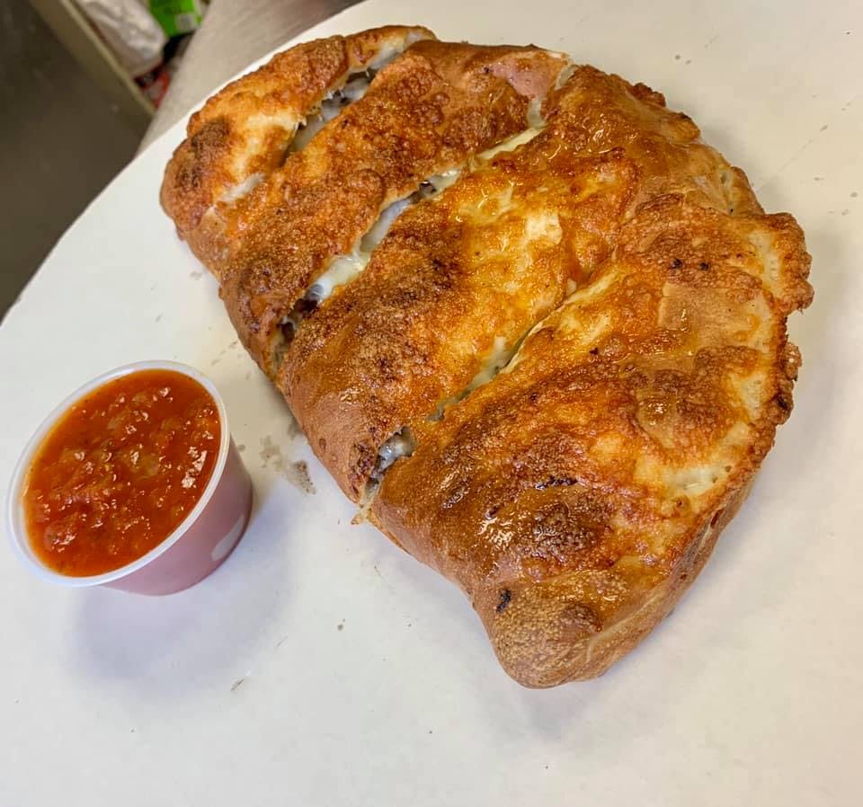 Order Calzone - Calzone food online from Durham House Of Pizza store, Durham on bringmethat.com